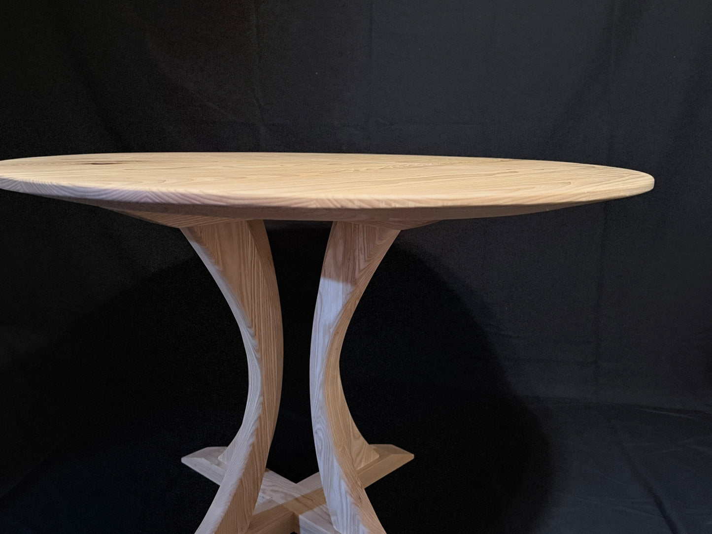 The Arc Pedestal Dining Table