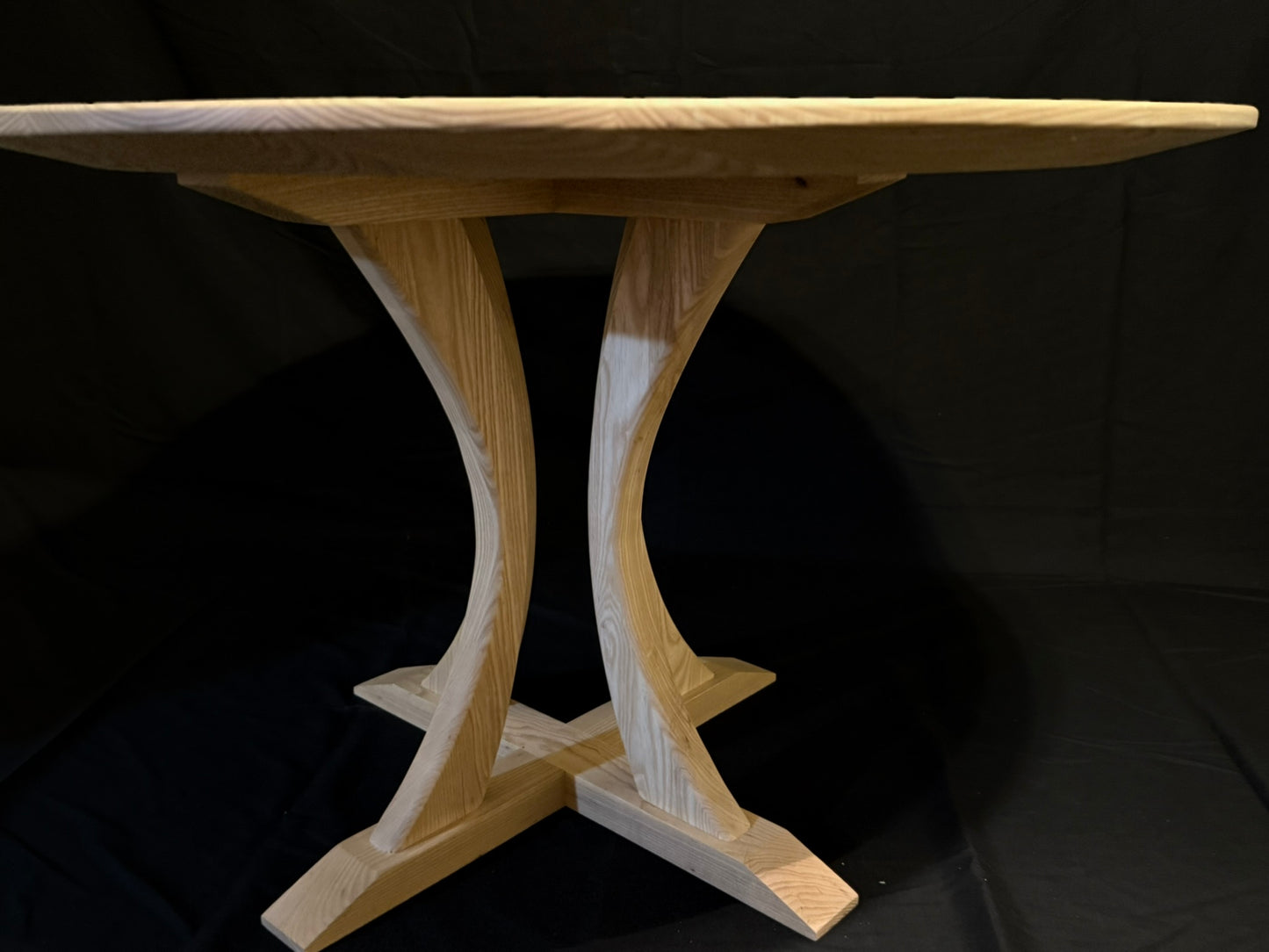 The Arc Pedestal Dining Table